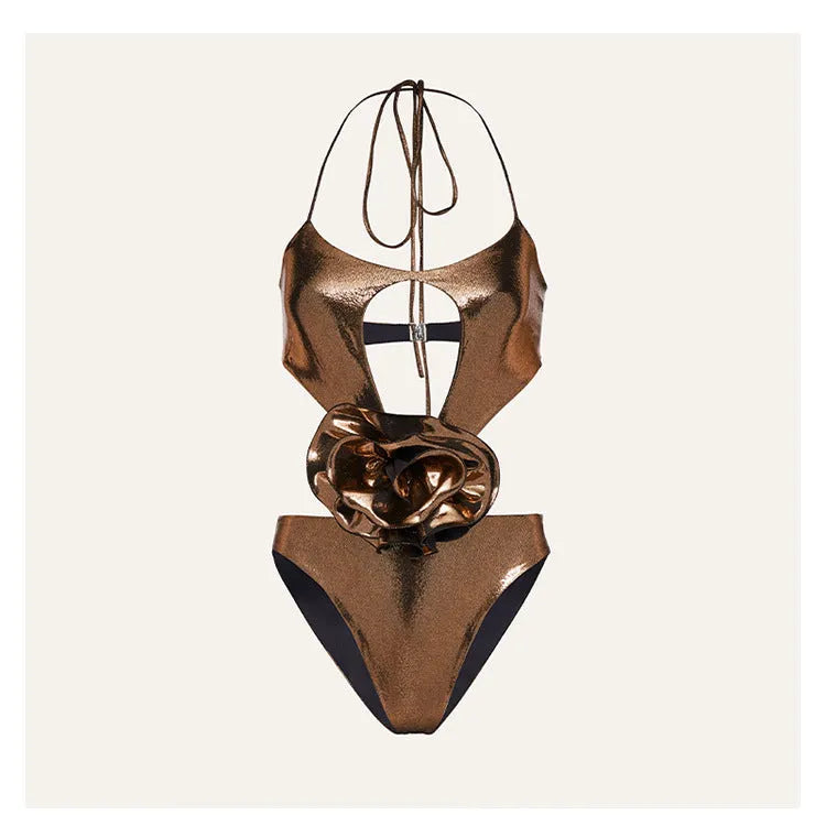 Gold coloured halter neck one piece swimsuit with a handmade hollow out flower design on the front.