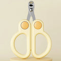 Pet nail clippers with round hole design, stainless steel blades, and ergonomic handles. Available in green or yellow.
