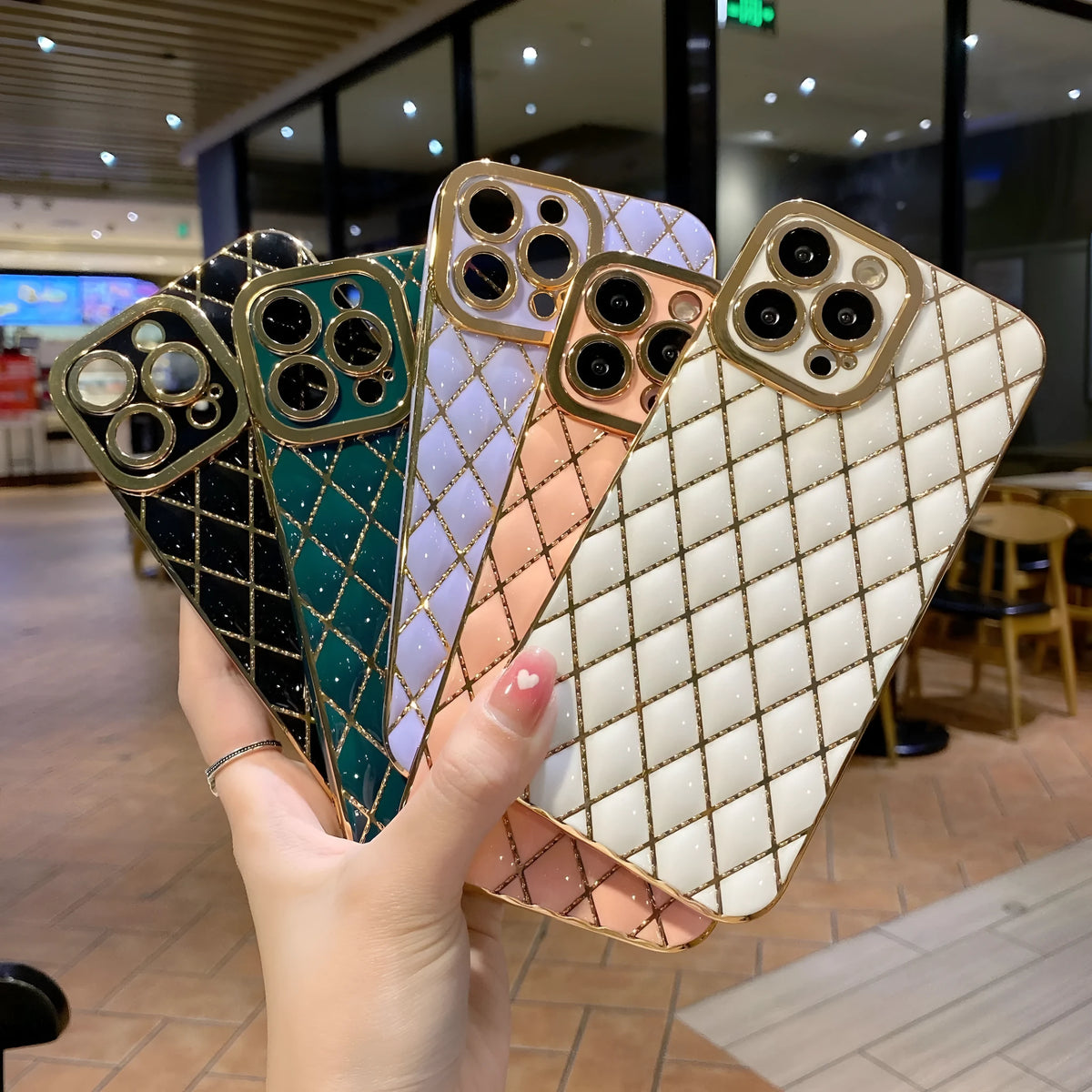 Electroplated 6D diamond TPU phone case back cover for compatible iPhone models in black, white, green, pink or purple.