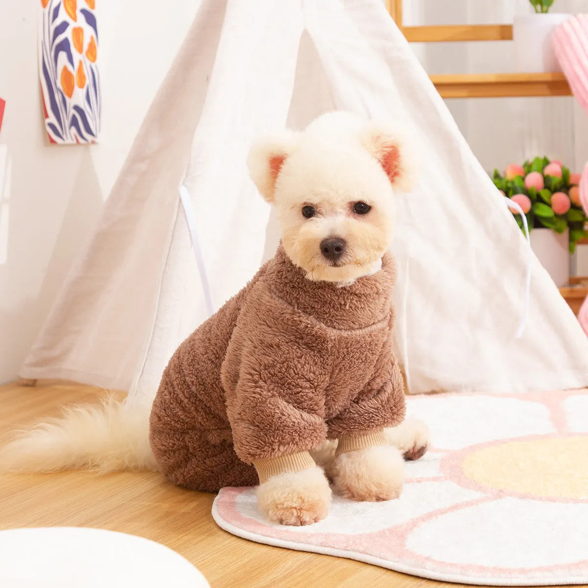 Khaki four-legged dog coat with high collar and plush fleece, shown with a towing ring on the back.