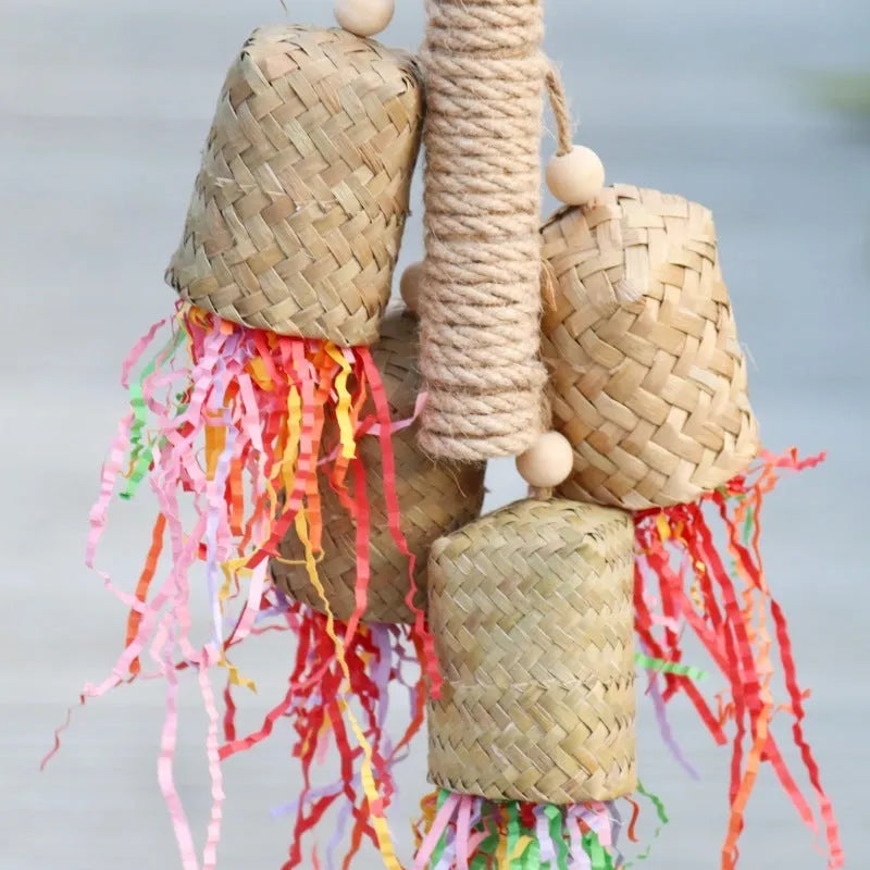 Colourful parrot shredding toy with natural wood and sisal rope measuring 15 by 35 centimetres