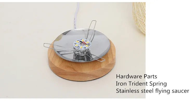 Brown hemp rope Sepak Takraw desk lamp with wooden base and USB cable.