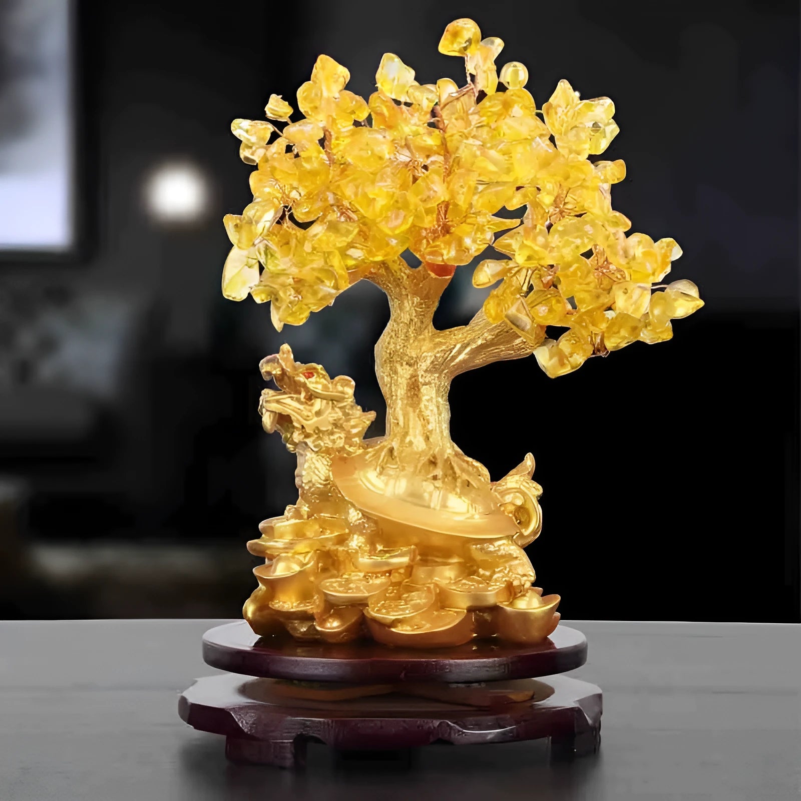 Citrine-coloured resin Feng Shui ornament of a water turtle with a money tree.