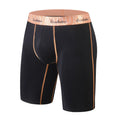 Men's cotton extended leg anti-friction boxers in black, front view