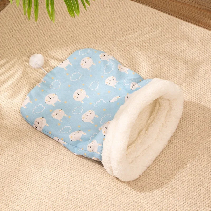 Cat sleeping bag nest measuring 50x40cm in pink, blue and striped flannel designs