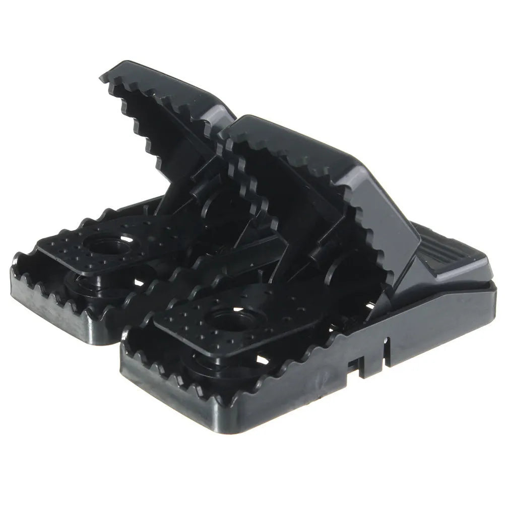 Six black plastic snapping mousetraps with measurements 11cm long by 5.5cm high