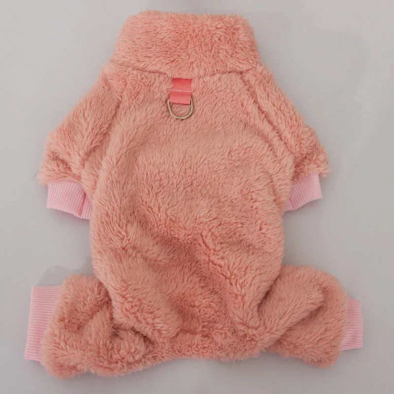 Khaki four-legged dog coat with high collar and plush fleece, shown with a towing ring on the back.