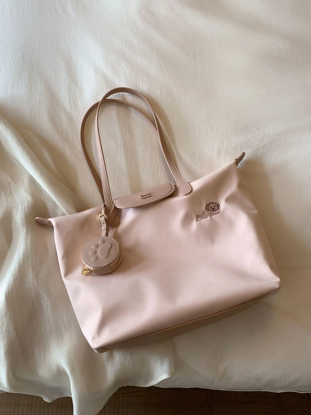 Large capacity Oxford cloth tote bag with sandwich pocket design and mobile phone compartment in pink colour