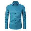 Men's grey stretch long sleeve work shirt made from polyester fabric on a hanger