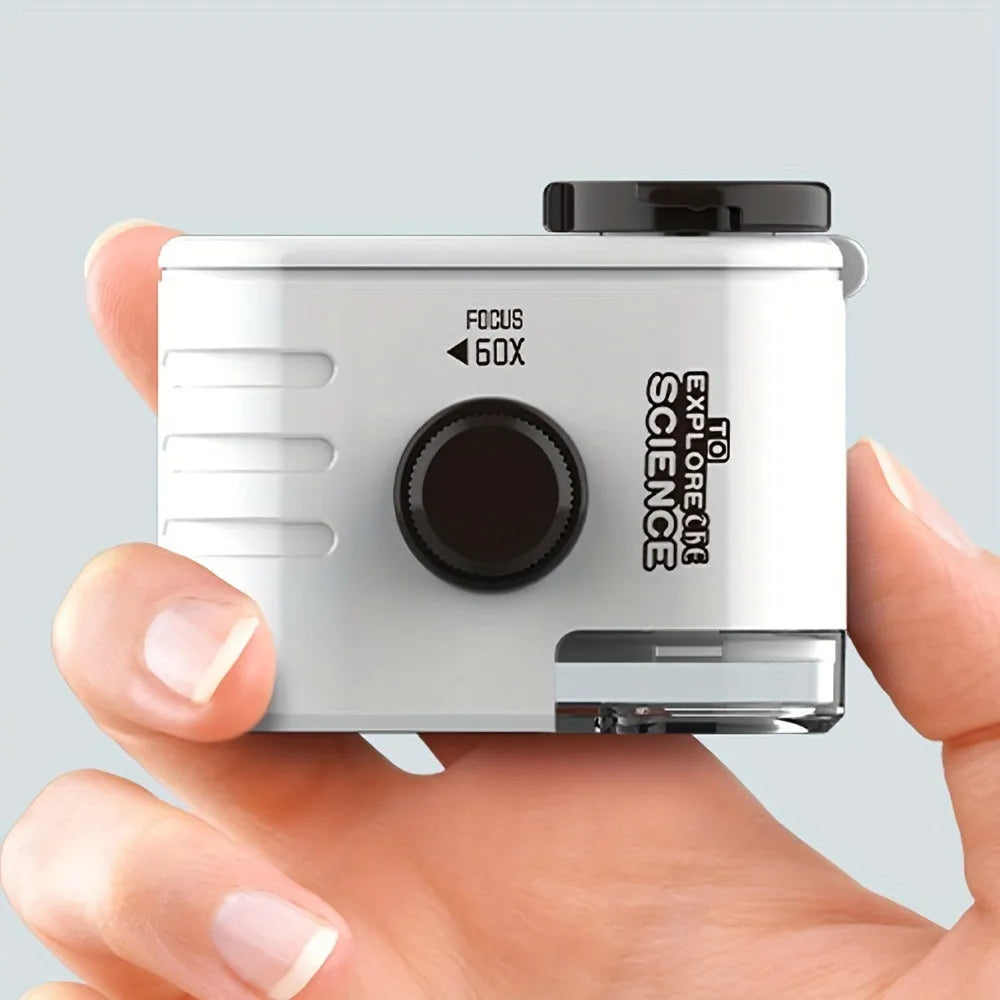 Pocket microscope with detachable clip for smartphone cameras showing 60x magnification and LED light