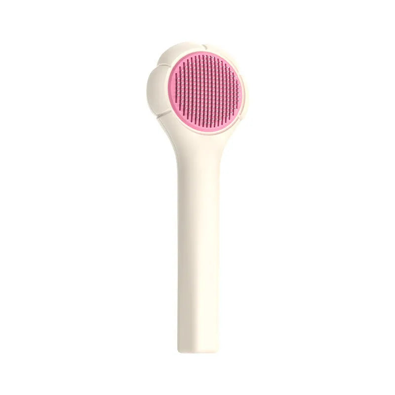 Floating needle comb for cats and dogs in green colour with ABS handle and steel teeth