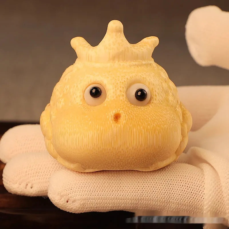 Solid bamboo carving of a cute Crown Princess Toad ornament with live eye detail.