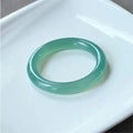 Natural agate wide tyre bracelet showing bead detail and colour variation with size measurement indicators