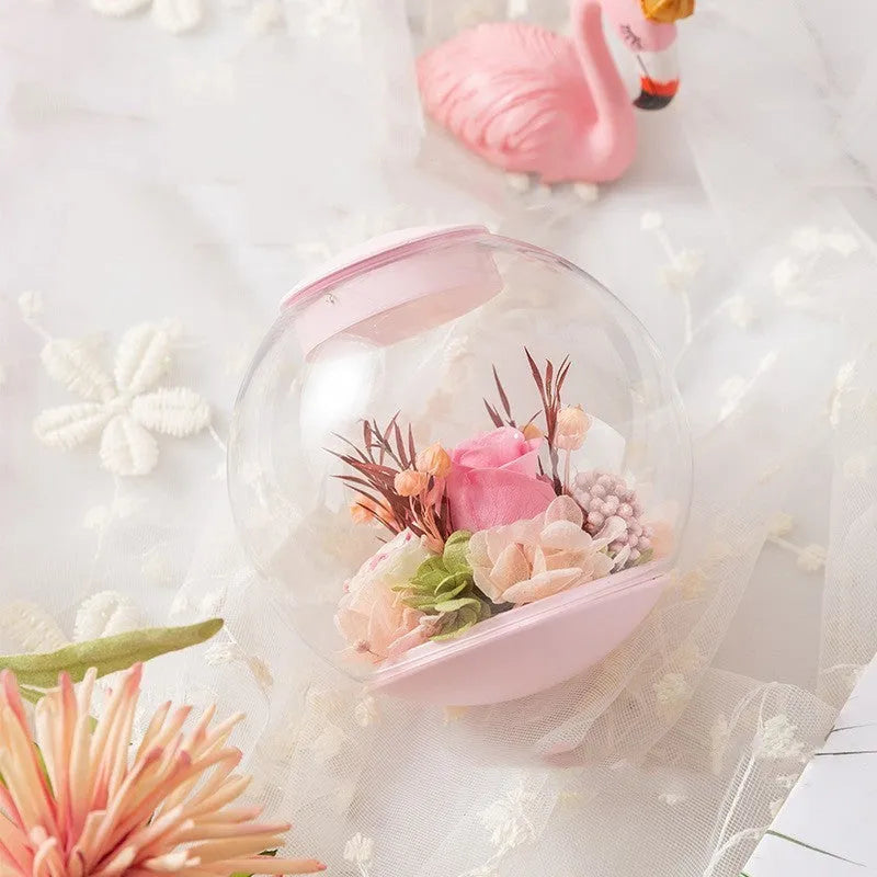 Pink preserved rose ornament with optional base and audio Bluetooth functionality for gift giving