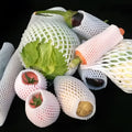 White foam fruit protective net cover shown in multiple size options for transport protection