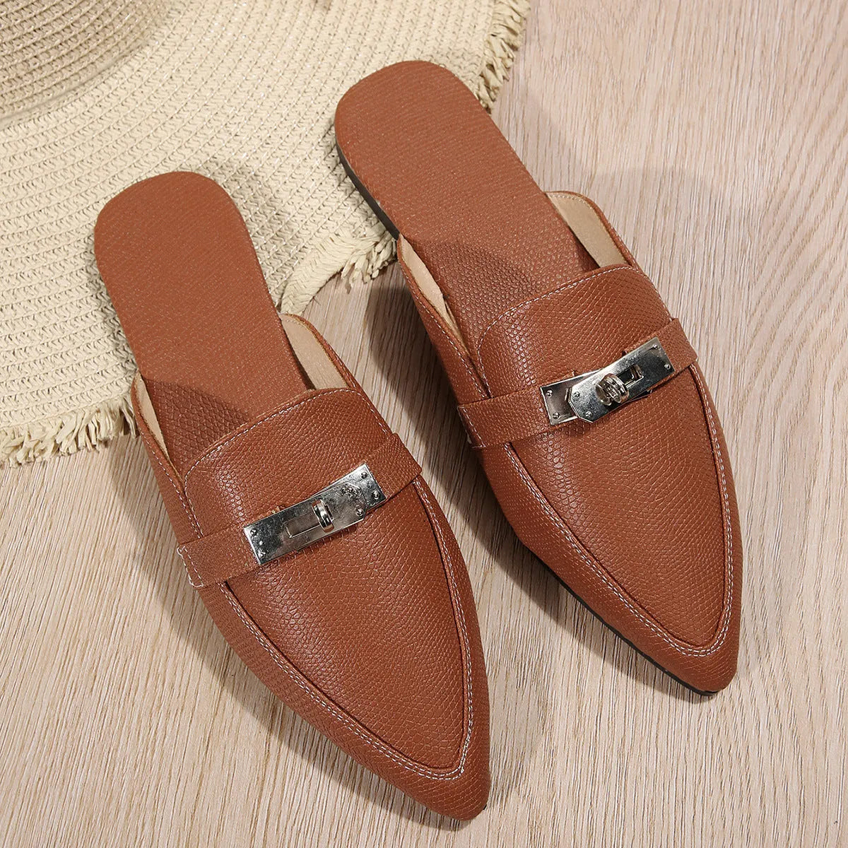Light brown women's pointed-toe low heel casual slippers with PU upper and rubber sole.