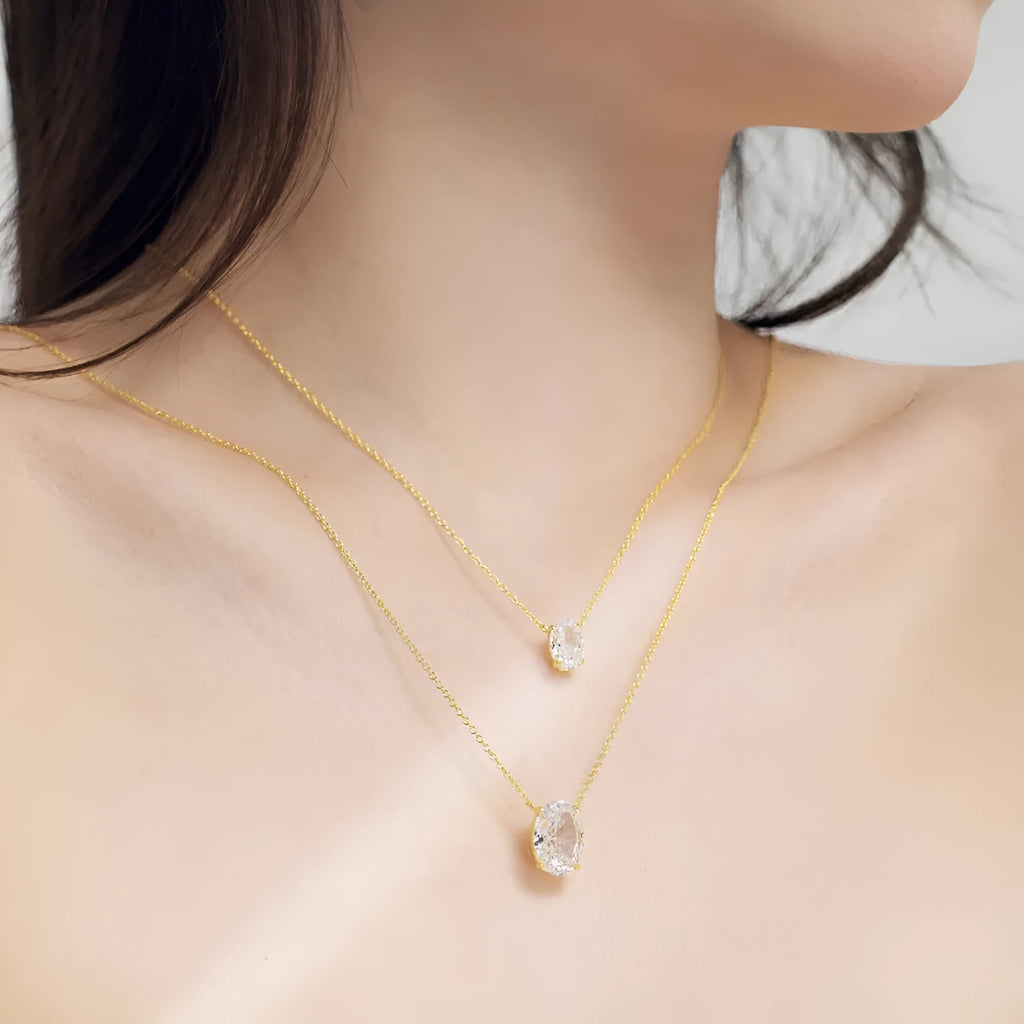 S925 sterling silver necklace with a geometric oval ice flower pendant in gold or platinum finish.