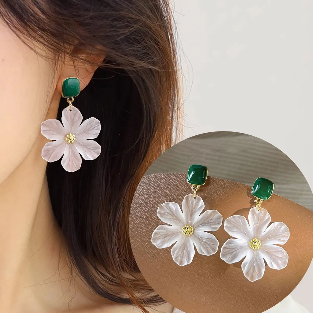 Dark green alloy earrings with sterling silver finish and sweet flower needle design