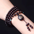 Zambia rosewood bead bracelet with 108 beads in flat lotus pendant design and grinding finish