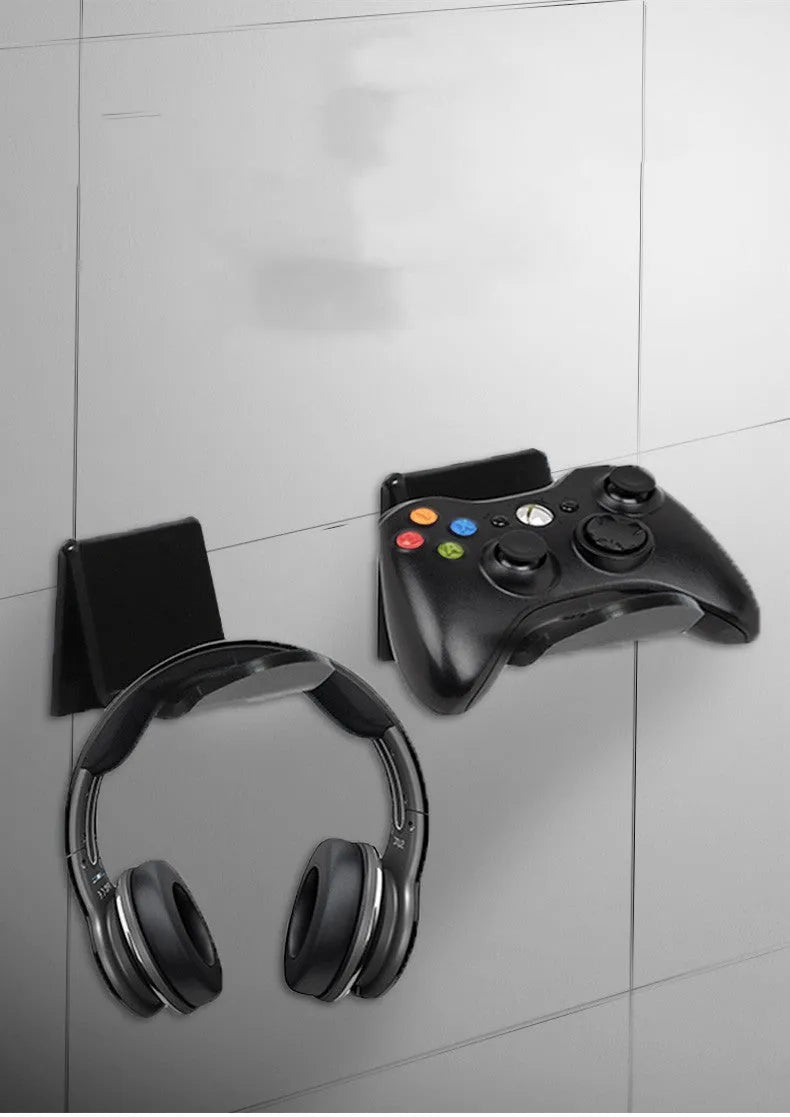 Universal game controller wall bracket in plastic available in black, white and transparent colours