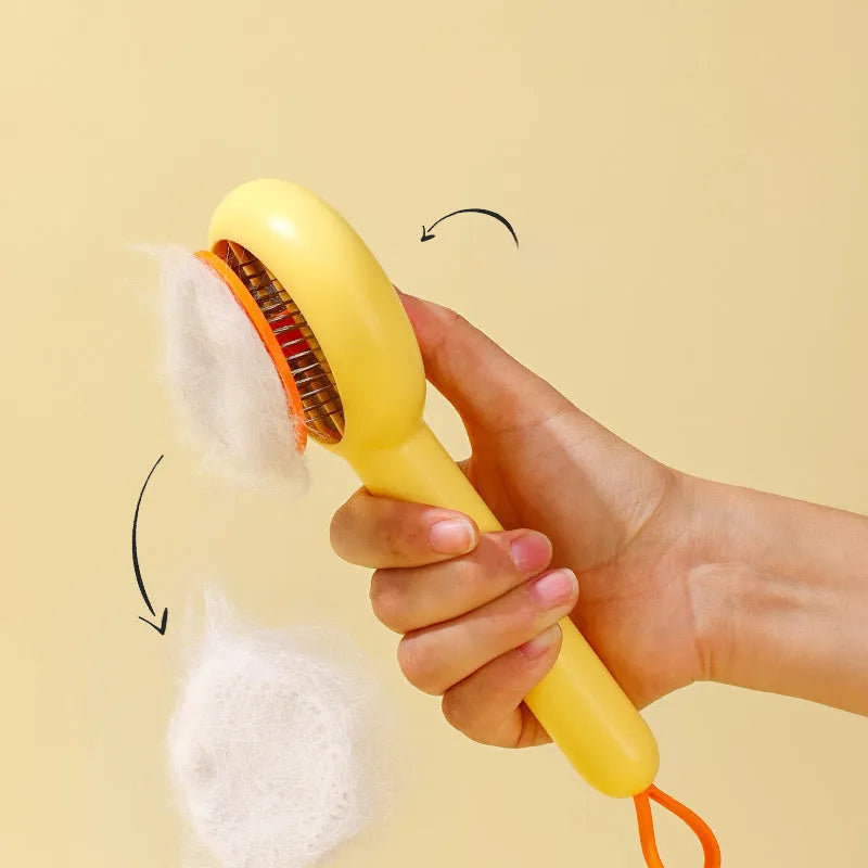 Small yellow duck comb brush for pet hair removal with open-section needle design