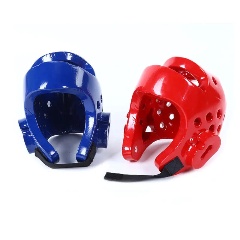 Red and blue karate protective gear set showing leg guards, helmet, and boxing gloves for martial arts training