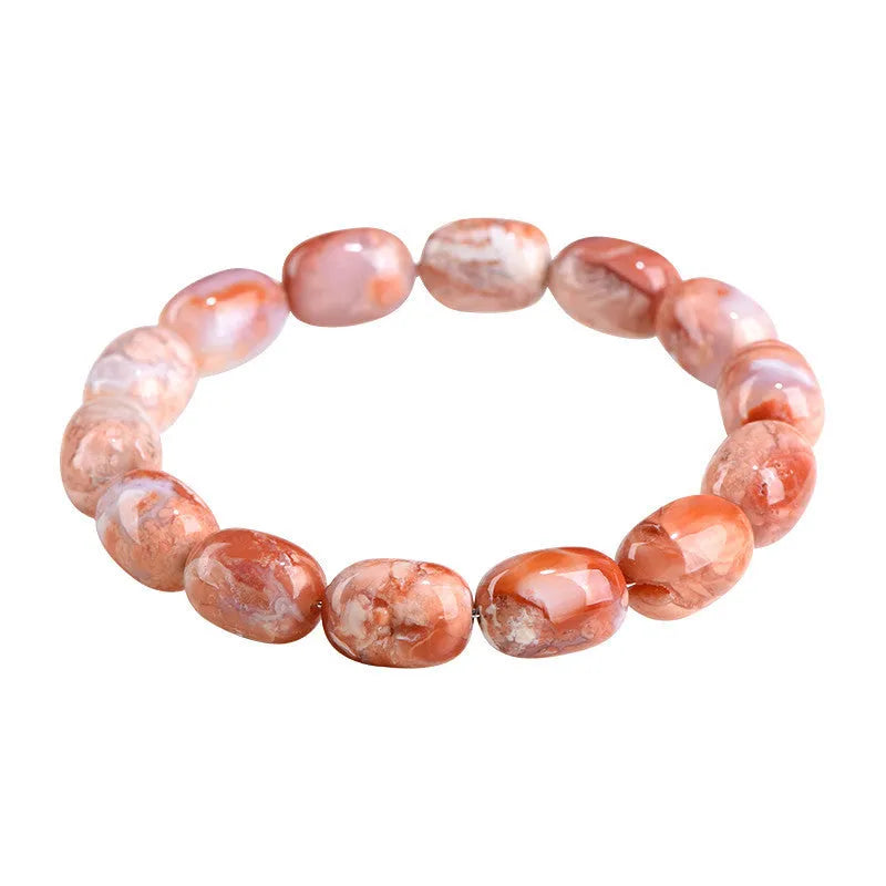 Natural cherry agate bracelet with 10x14mm barrel beads and a geometric ruyi design.