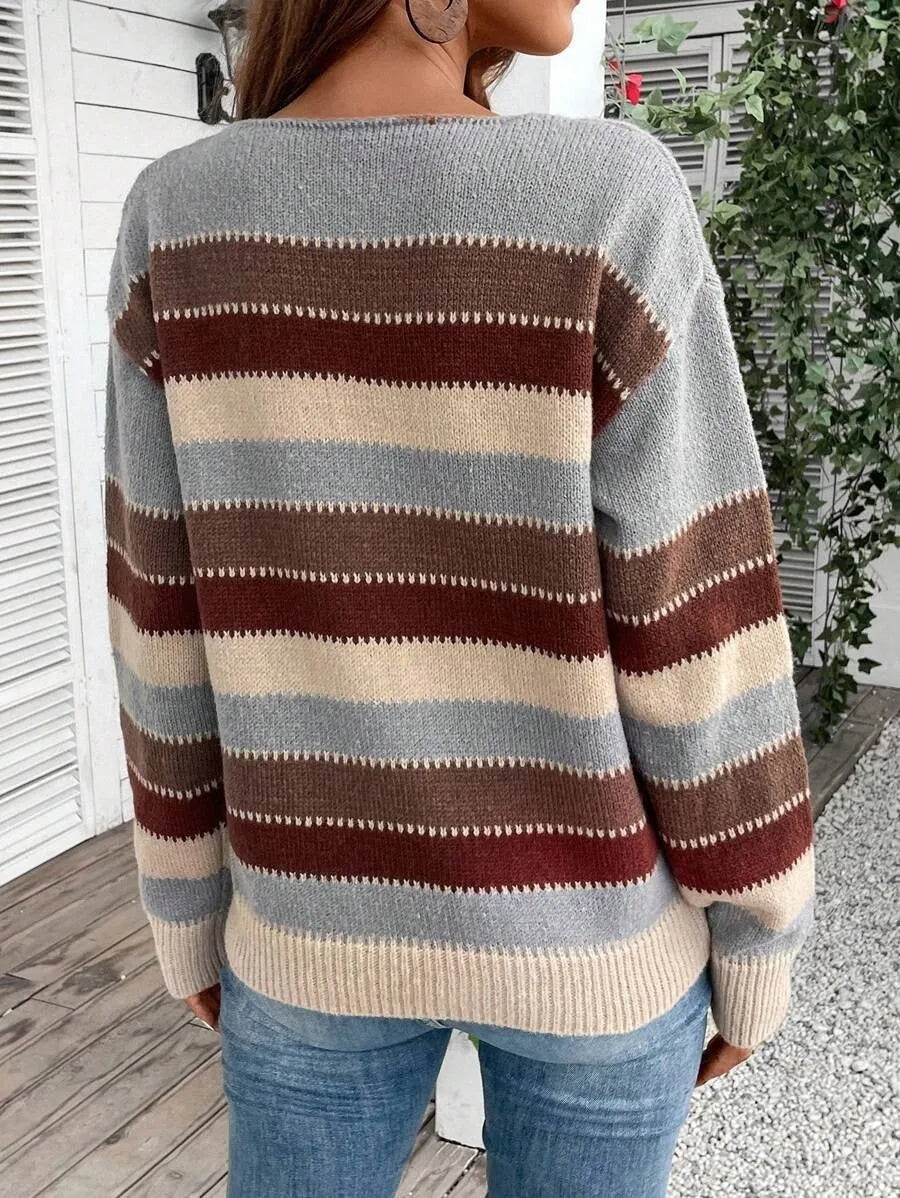 Women's colourblock striped pullover sweater in polyester, shown in black, blue, and grey.