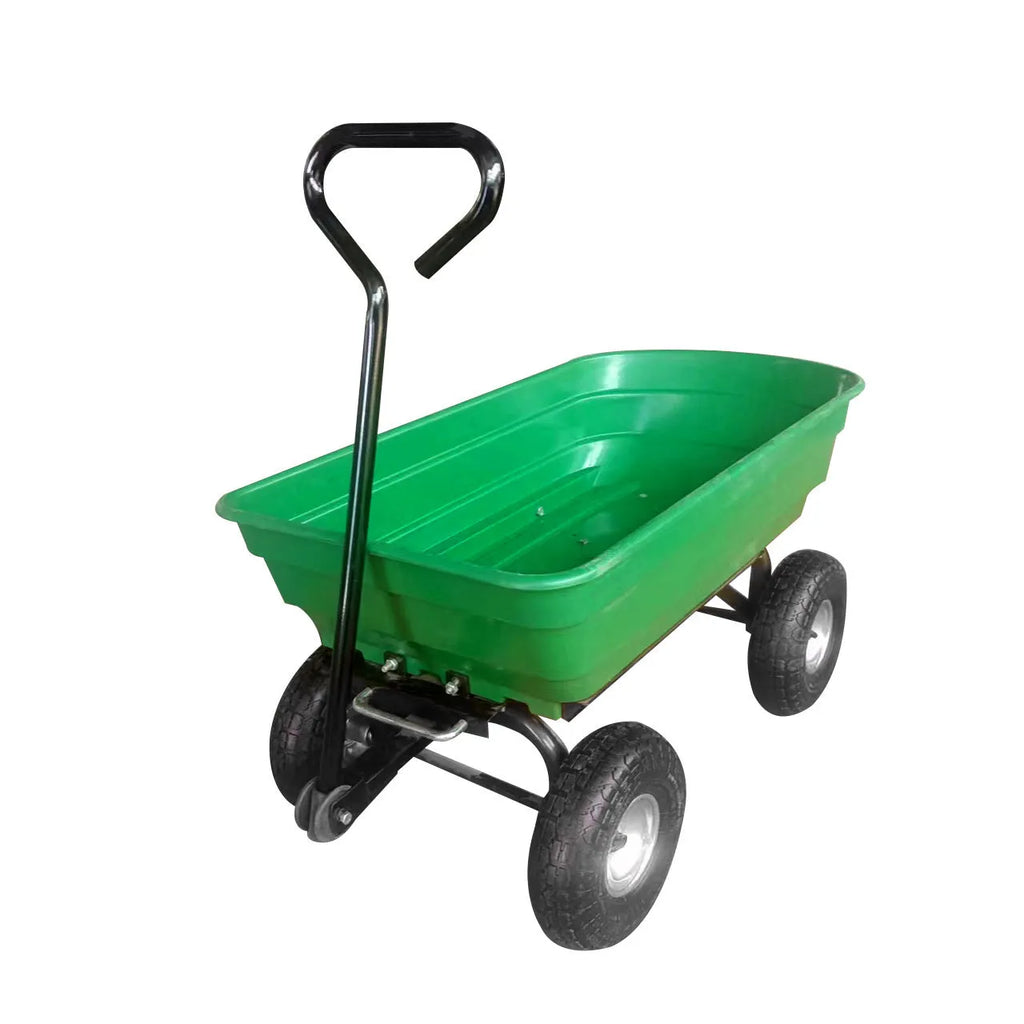 Green TC2145 four-wheel toy dump truck with steel frame and plastic body in a garden setting.