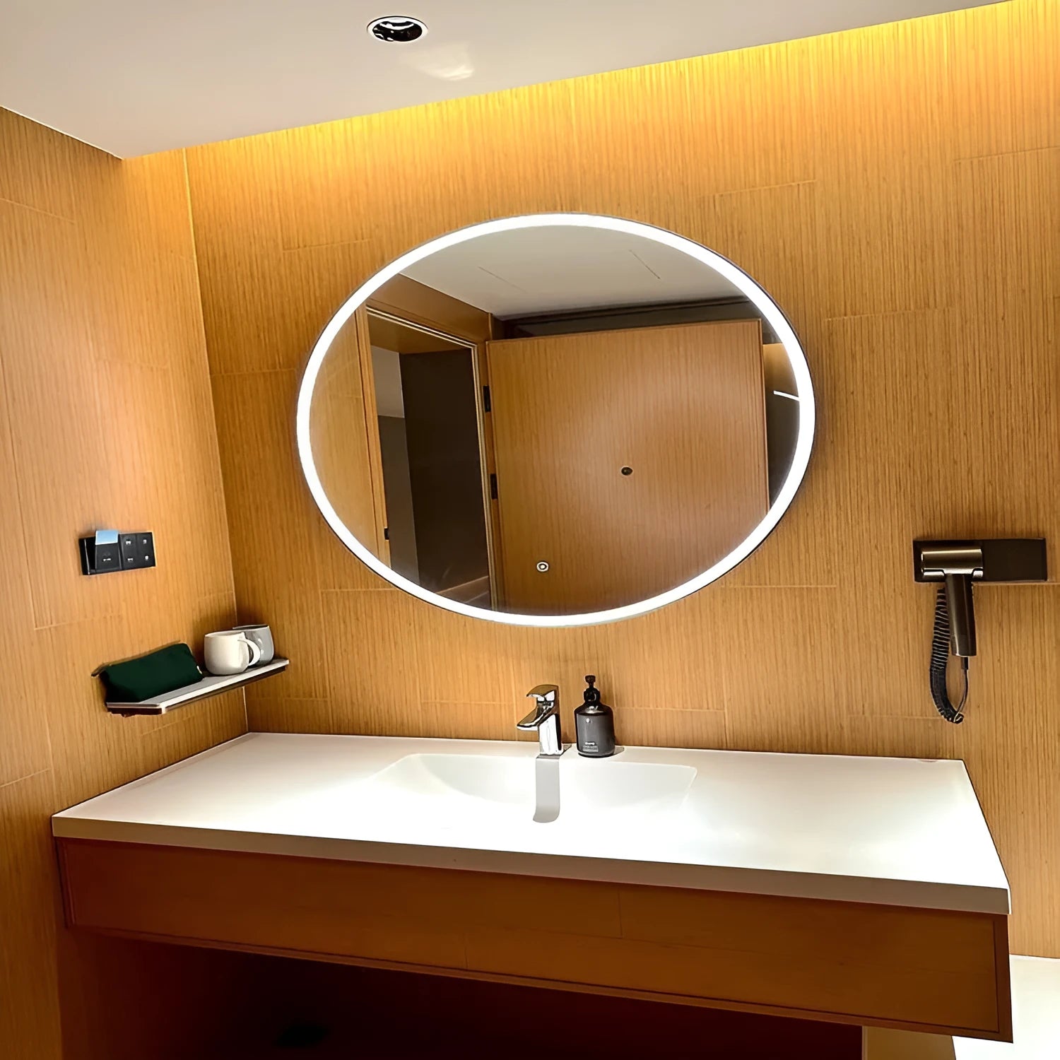 Round wall-mounted LED bathroom makeup mirror with a black aluminum alloy frame.