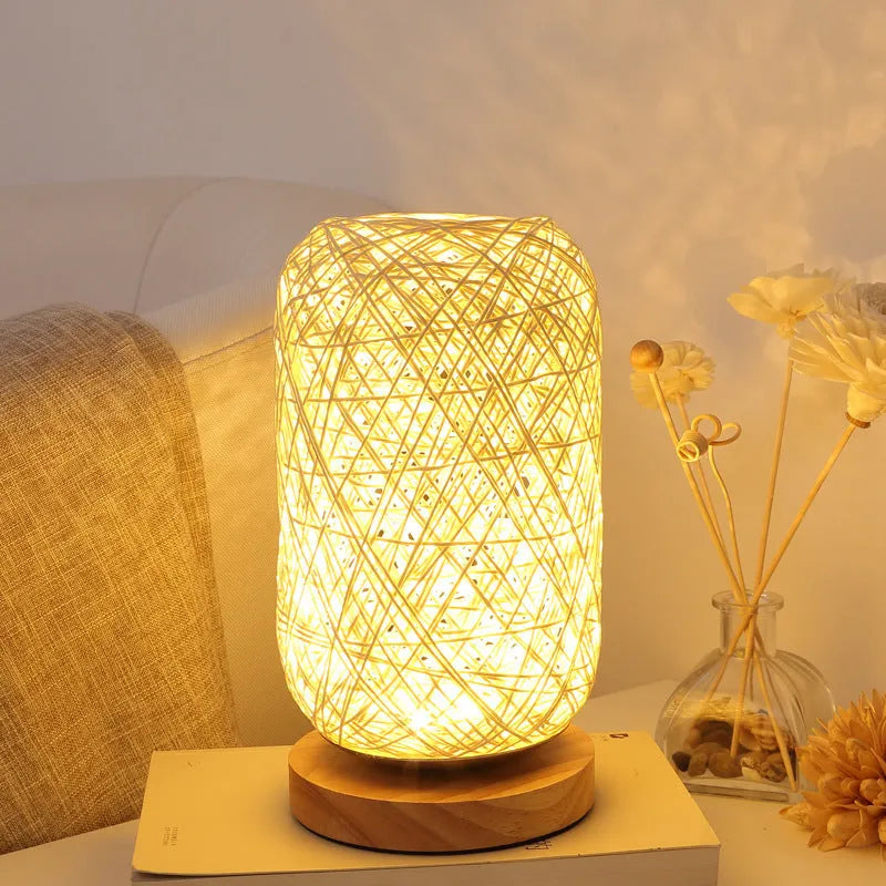 Brown hemp rope Sepak Takraw desk lamp with wooden base and USB cable.