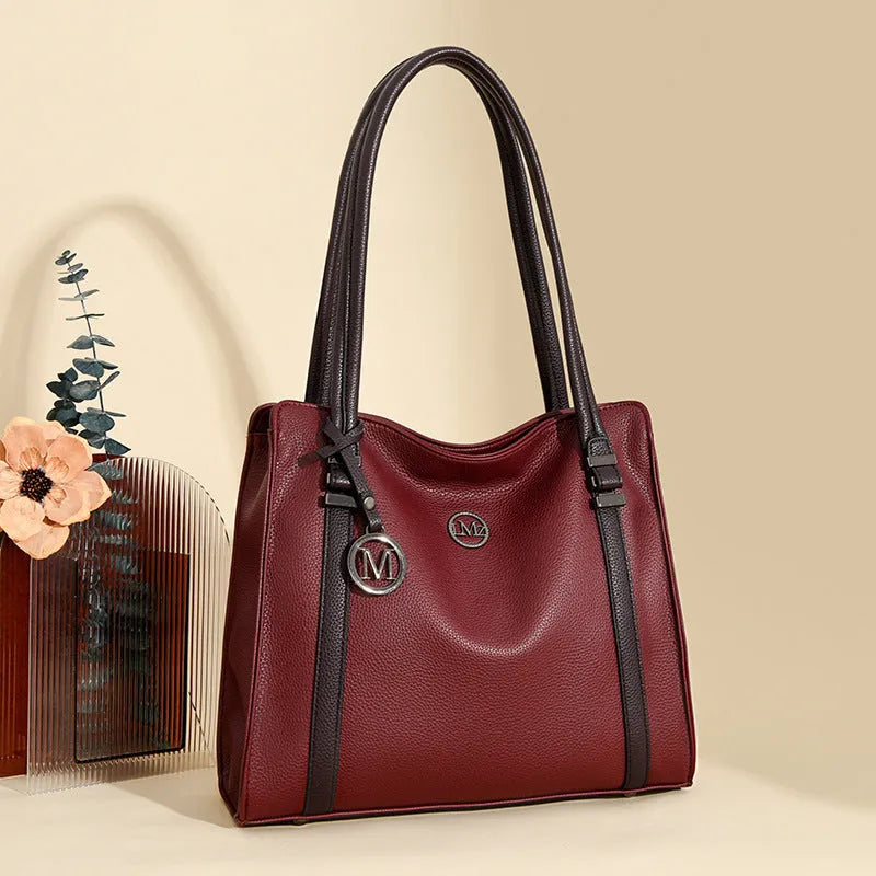 Women's large soft PU leather crossbody bag in retro style with double straps, shown in black.