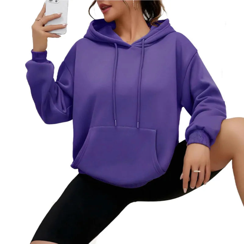 Women's loose grey drawstring hood sweatshirt with a front kangaroo pocket on a hanger.
