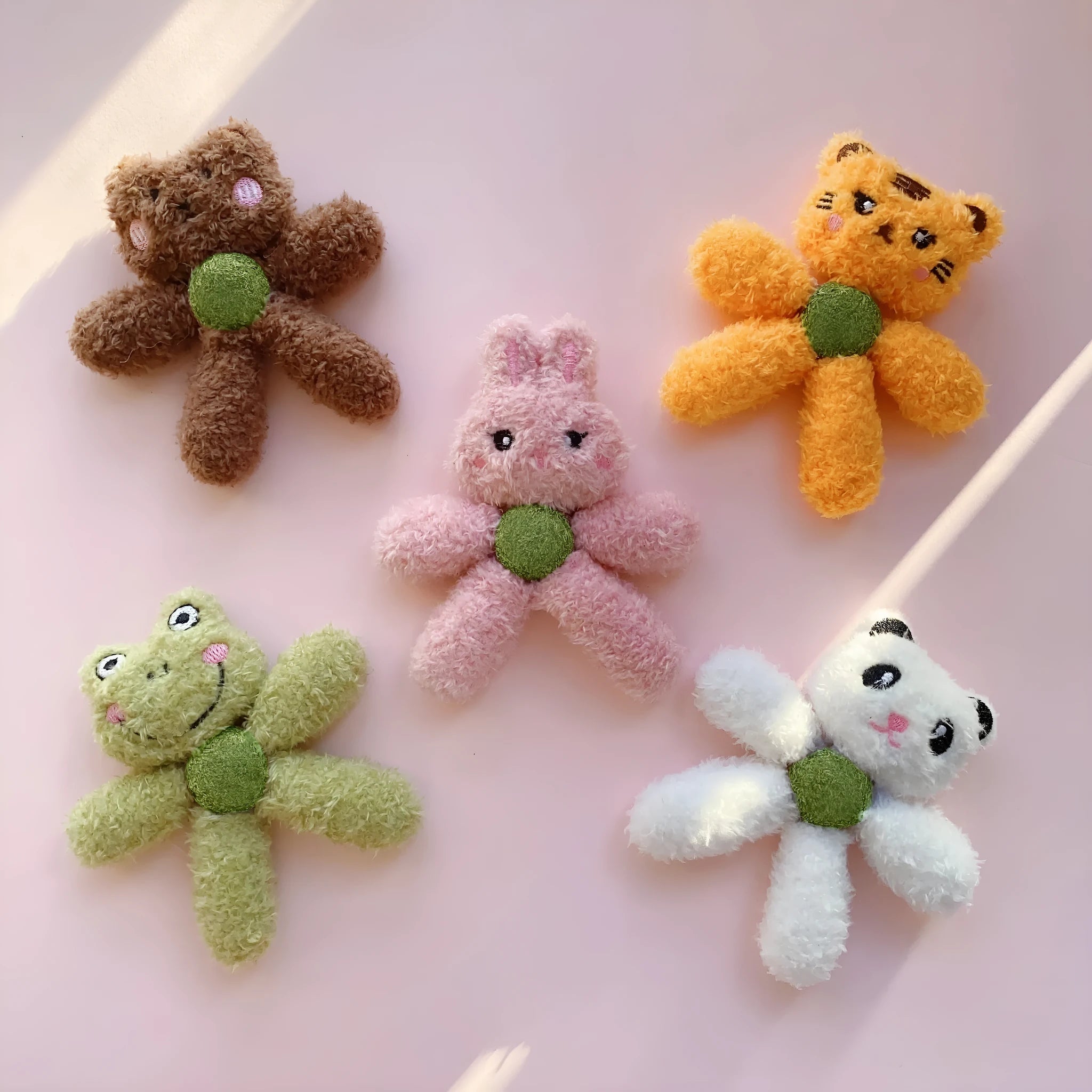 Indoor catnip chewing toy ball with cat grass, shown in animal designs like panda and bunny.