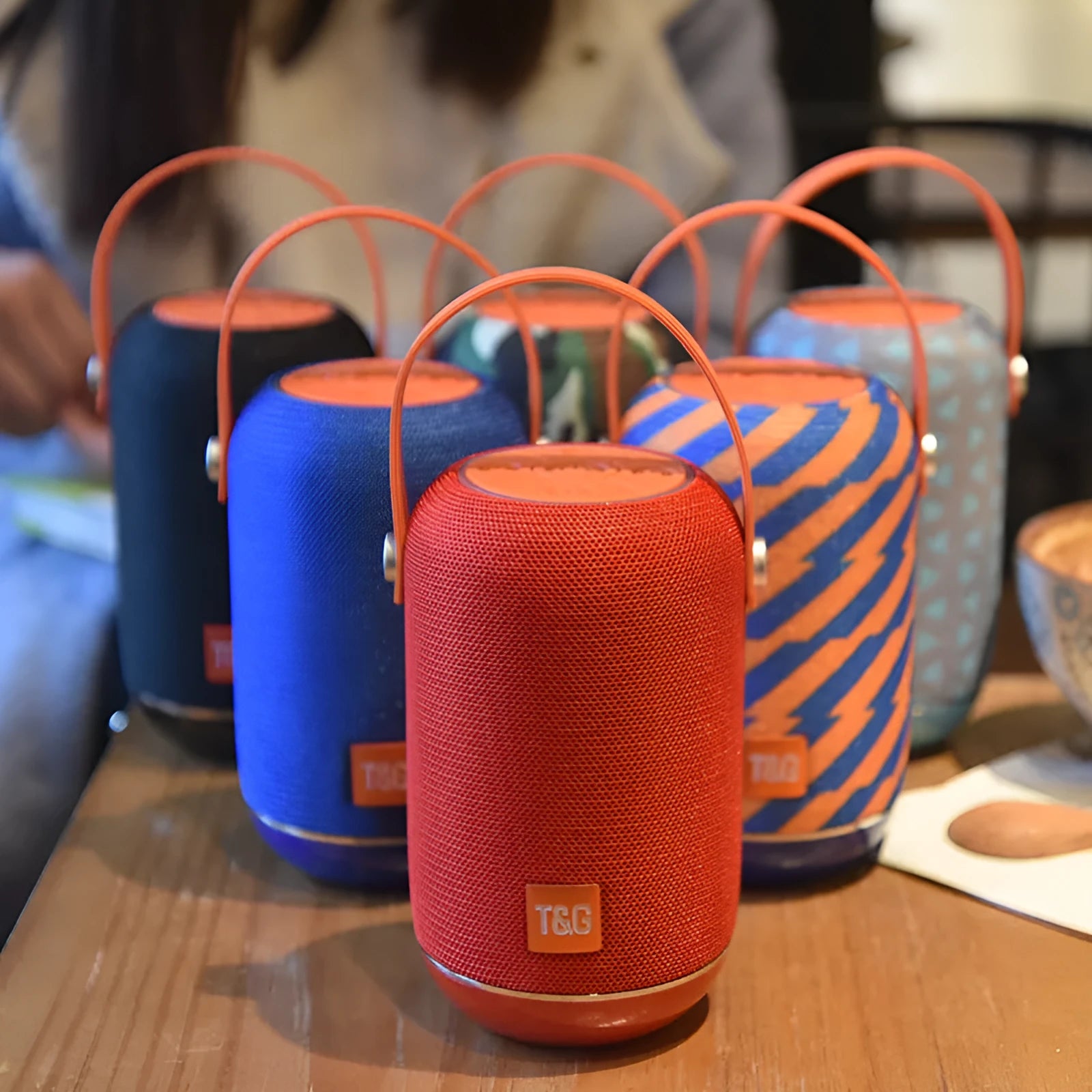 TG107 Fabric Wireless Bluetooth Portable Speaker in black with compact rectangular body and fabric finish