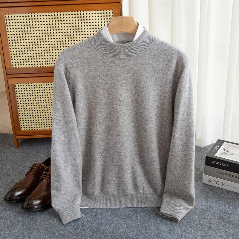 Men's half-collar wool sweater in loose fit showing colour options including black, brown and camel