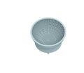 Cyan silicone dog bowl with textured licking mat surface and a suction cup base on a table.