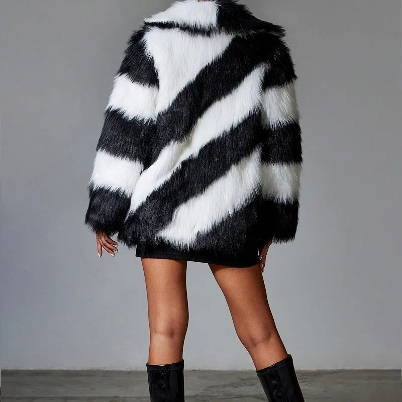 Women's faux fur coat with contrasting lapels and a full fur collar in a regular fit.