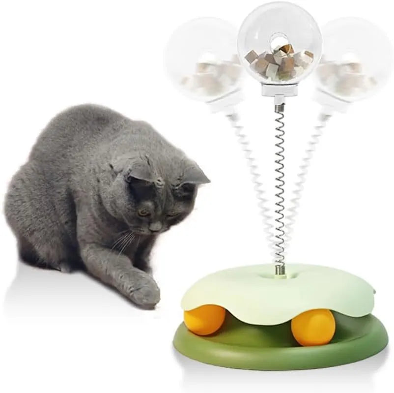 Blue cat treat dispenser toy with track ball design for interactive feeding and play