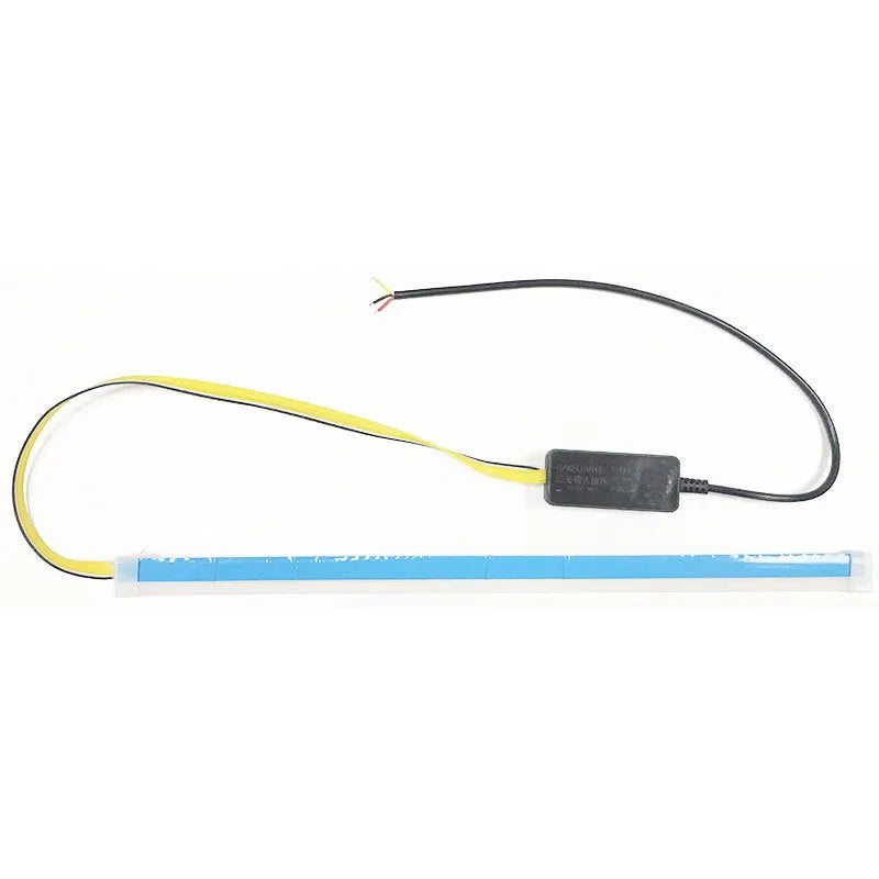 Car LED daytime running light strip with flowing turn signal effect in blue to yellow colour.