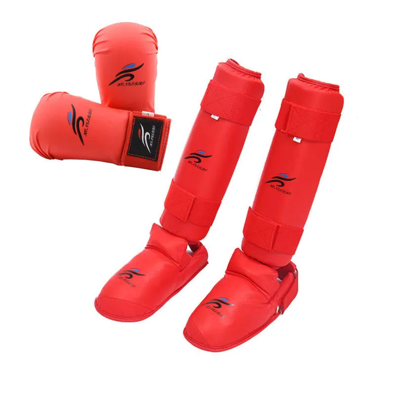 Red and blue karate protective gear set showing leg guards, helmet, and boxing gloves for martial arts training