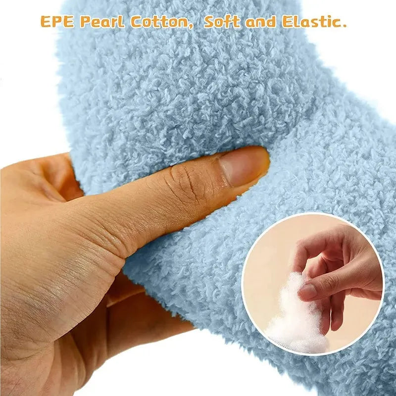 Plush white U-shaped pet pillow with raised rim for a cat or small dog to sleep curled up.
