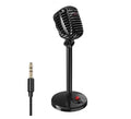 Black USB condenser microphone on an adjustable stand for computer recording and podcasting.