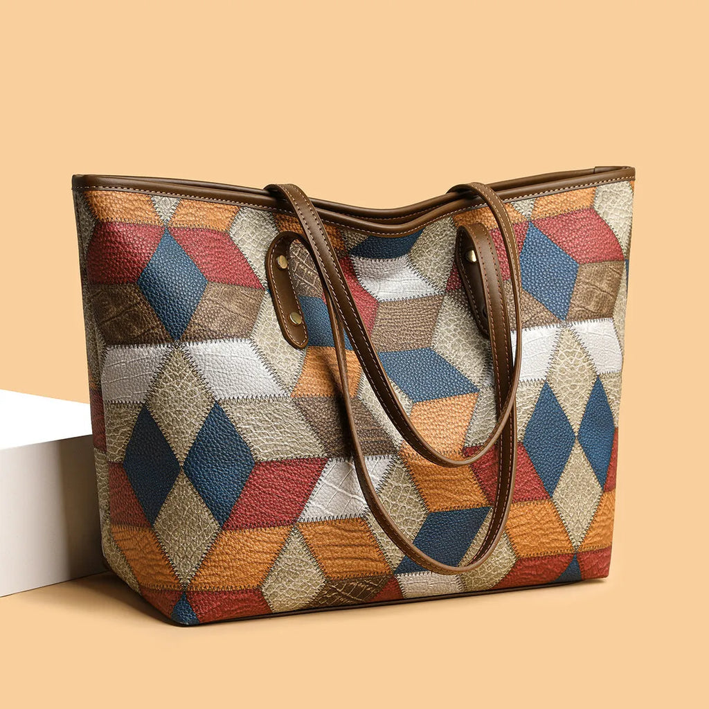 Women's large capacity PVC handbag in blue brown colour with sandwich pocket outer design