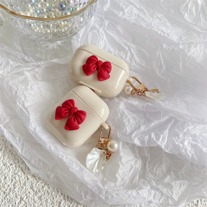 Beige red bow shell pendant TPU case for Apple AirPods wireless earphones with clamshell design