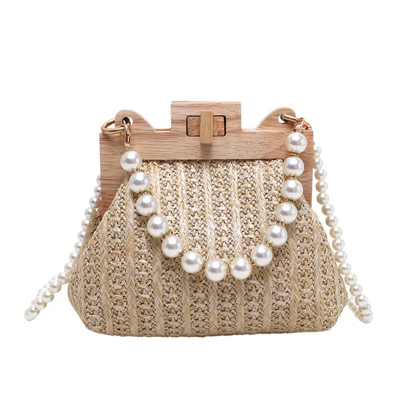 Women's straw shoulder bag with woven pearl chain detail and multiple internal compartments