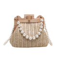 Women's straw shoulder bag with woven pearl chain detail and multiple internal compartments