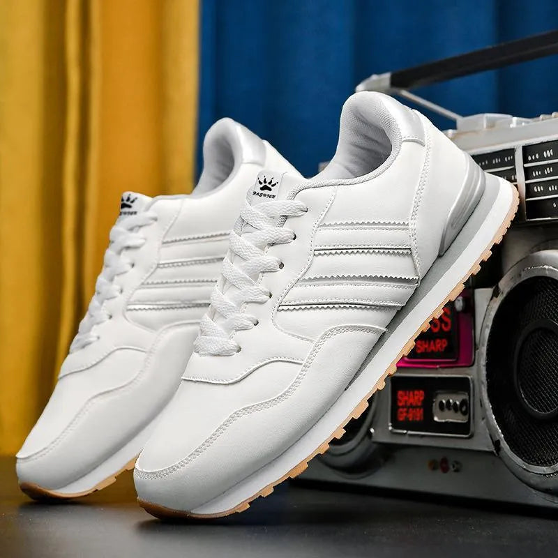 Men's casual running sports shoes with carved wing pattern in black and white space leather