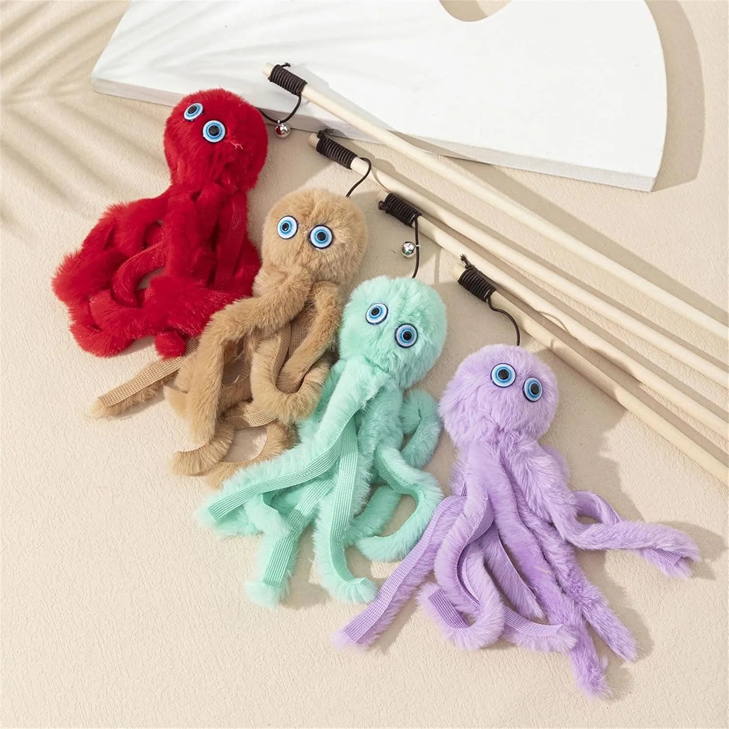Colourful octopus cat toy with eyes on a long stick for interactive indoor play with kittens and cats