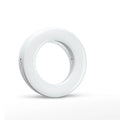 Compact black selfie ring light with USB cable for mobile phone photography and video lighting.